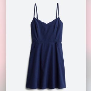 Linen dress with scalloped detail